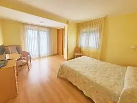 Dotmitorio de hotel de Villa Juanita 