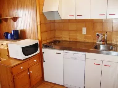 cocina_4-apartamentos-paradis-blanc-3000pas-de-la-casa-estacion-grandvalira.jpg